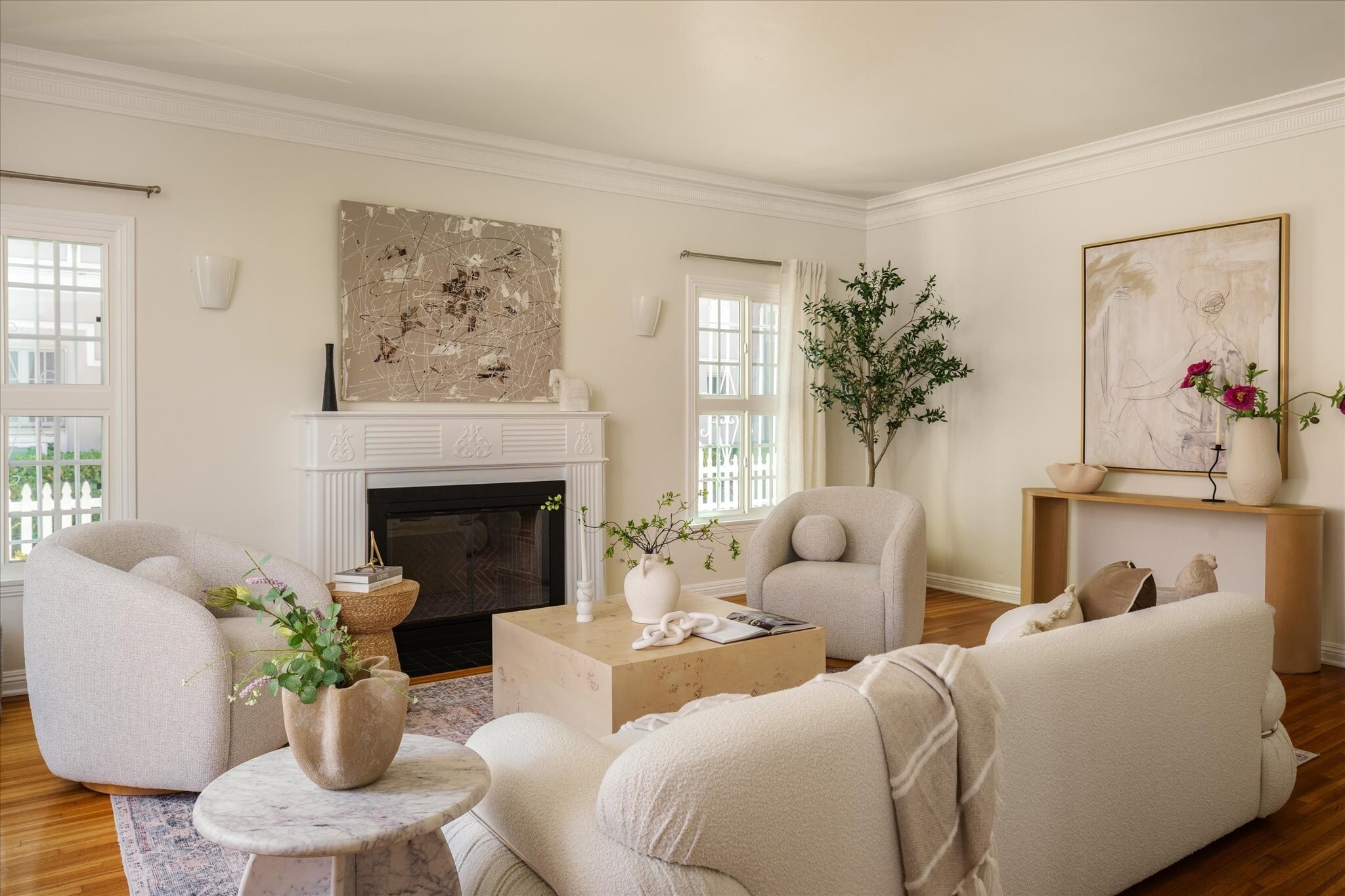 Living room, decorative fireplace, crown moldings - 215 S Poinsettia Pl