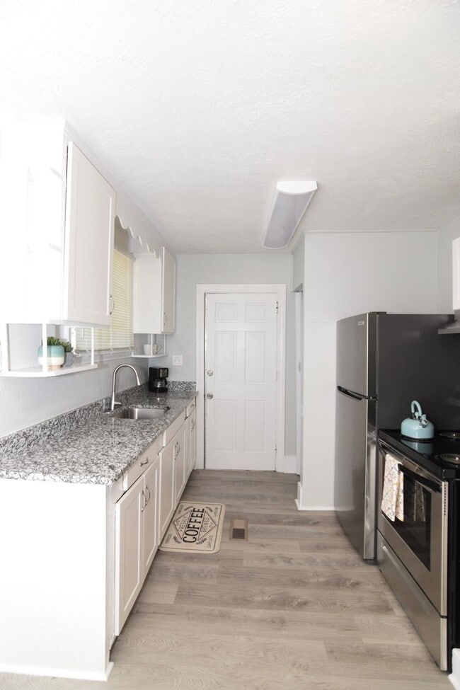 Building Photo - $995 - Updated 3 bed/2 bath house for rent off Wrightsboro Road, with fenced-in yard!