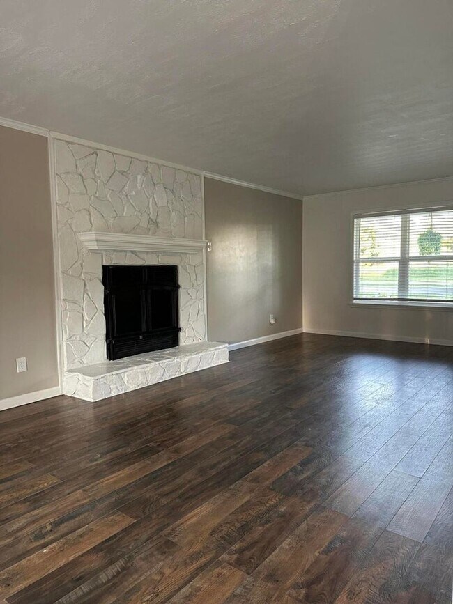 Building Photo - Move-In Ready Corner-Lot Home with Wraparound Porch Near Fort Eisenhower