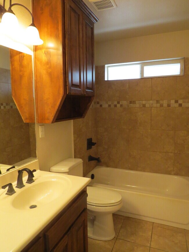 Building Photo - "Spacious 4-Bed Oasis in Killeen with Granite Touches & Cozy Fireplace!"