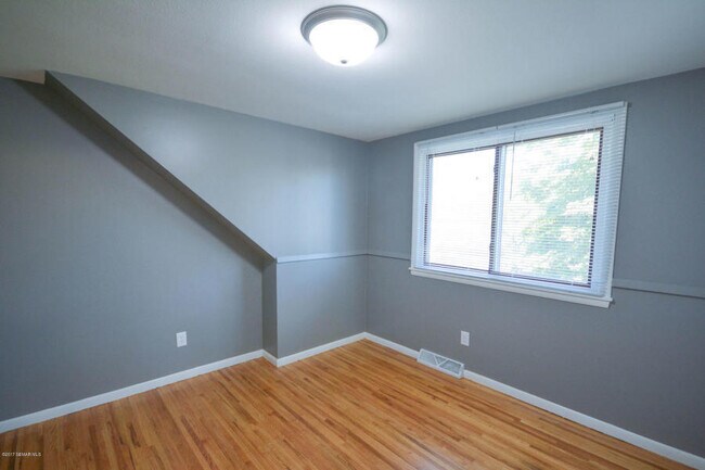 Building Photo - Cape Cod style home - completely updated throughout!
