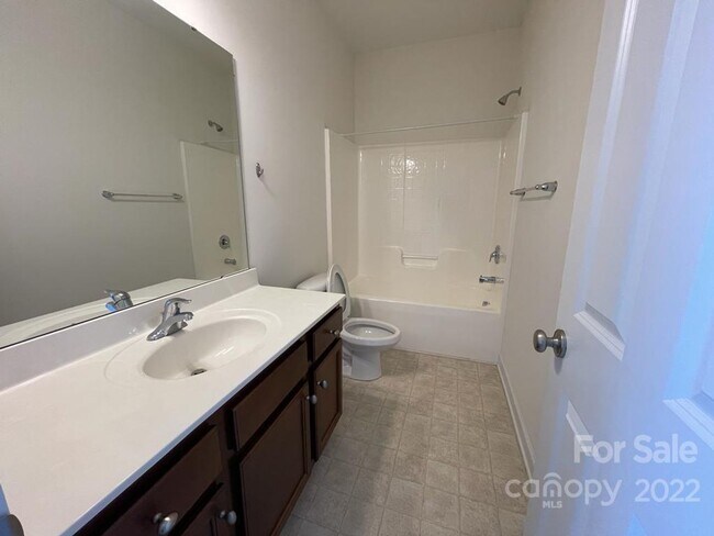 Building Photo - Short Term Rental Coming Soon! 3 BR/2.5BA | Renovated Townhome | 2-Car Garage Parking |Neighborho...