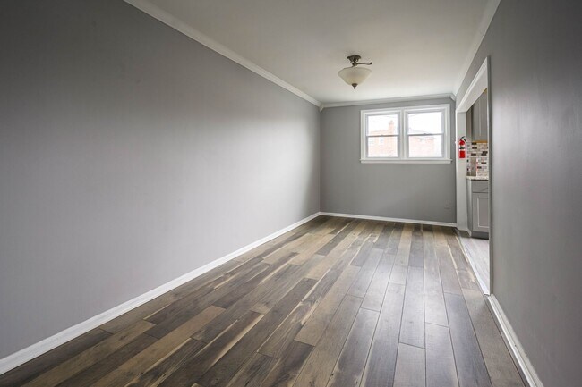 Building Photo - Completely renovated end row home! Stainle...