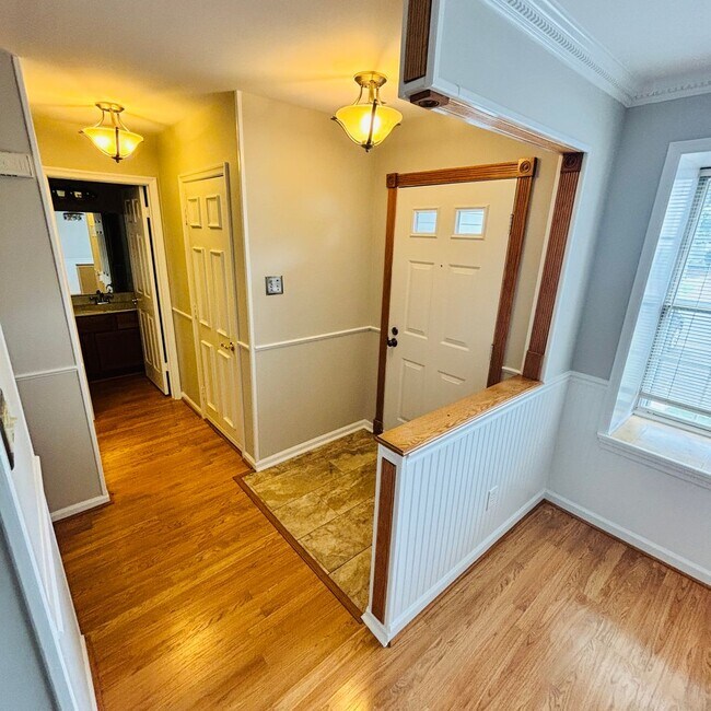 Building Photo - Spacious 3-Bedroom, 3-Bathroom Townhome with Finished Basement, Garage & Fenced Yard