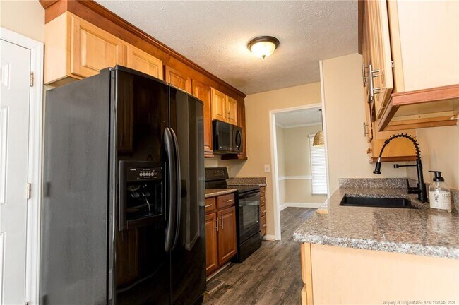 Building Photo - 6944 Calamar Dr