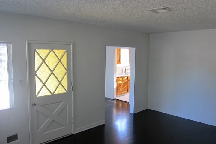 Living Room looking into dining room and kitchen (unfurnished) - 4927 Forman Ave