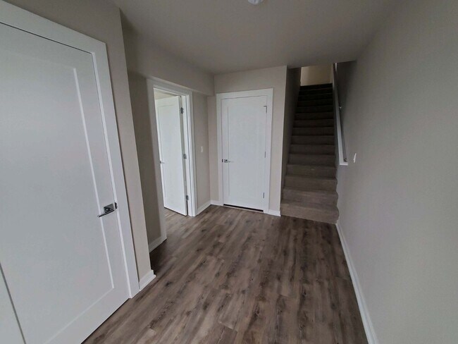 Building Photo - BEAUTIFUL NEWER CONSTRUCTION 4 BD HOME W/2 CAR GARAGE, W/D IN UNIT, AND MORE!