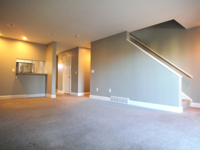 Living room/stairs - 51 4th Ave