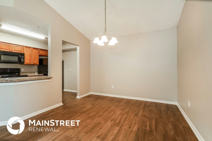 Building Photo - 9845 Paddlewheel Dr W