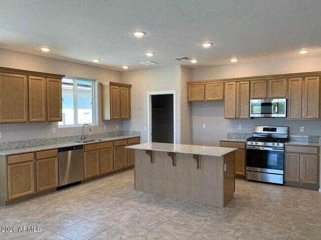 Building Photo - 13484 W Range Mule Dr