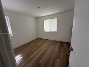 Building Photo - Woodgate Court, Sunrise, FL 33326 - 3 BR 2 BA villa