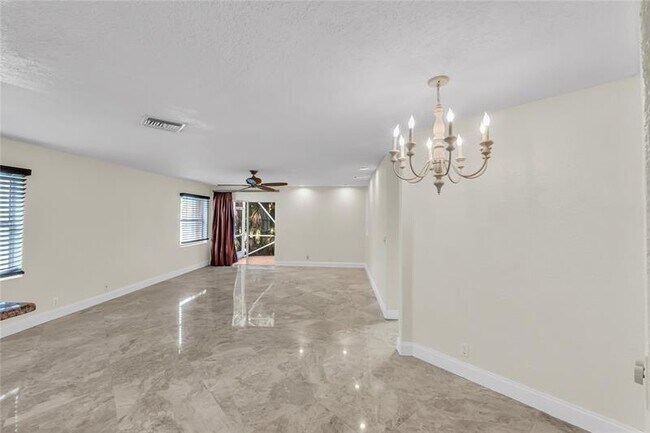 Building Photo - 5911 NW 59th Ave