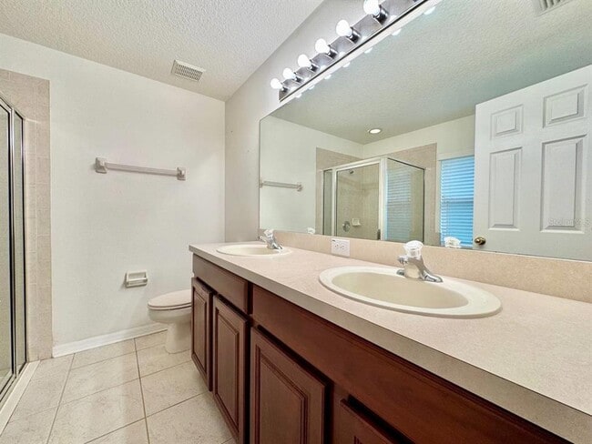 Building Photo - 5814 Sweet William Terrace