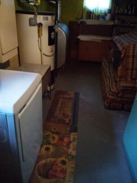 Basement Mechanical Room With Dryer, Furnace and Hot Water Heater - 207 Sunflower Ave