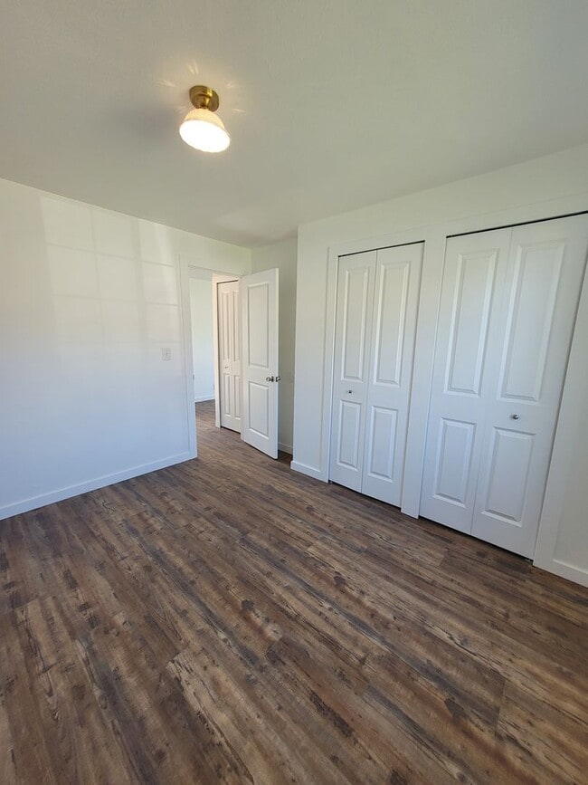 Building Photo - Free May rent with 1 Year Lease - Fully Remodeled with Garage & Yard Care Included