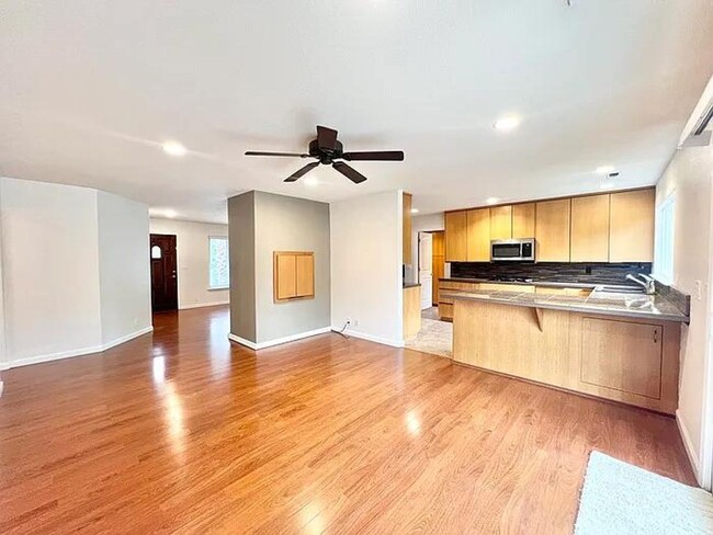 Building Photo - beautifully updated home offers a spacious...