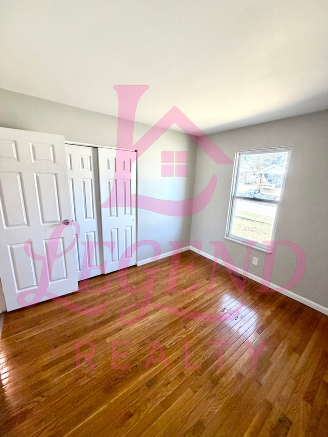 Building Photo - Spacious 4-Bedroom Home with Private Primary Suite & Hardwood Floors!