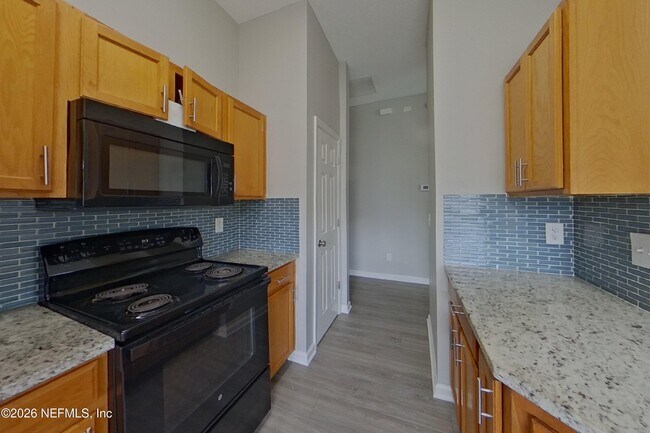 Building Photo - 6830 Shoreline Ln