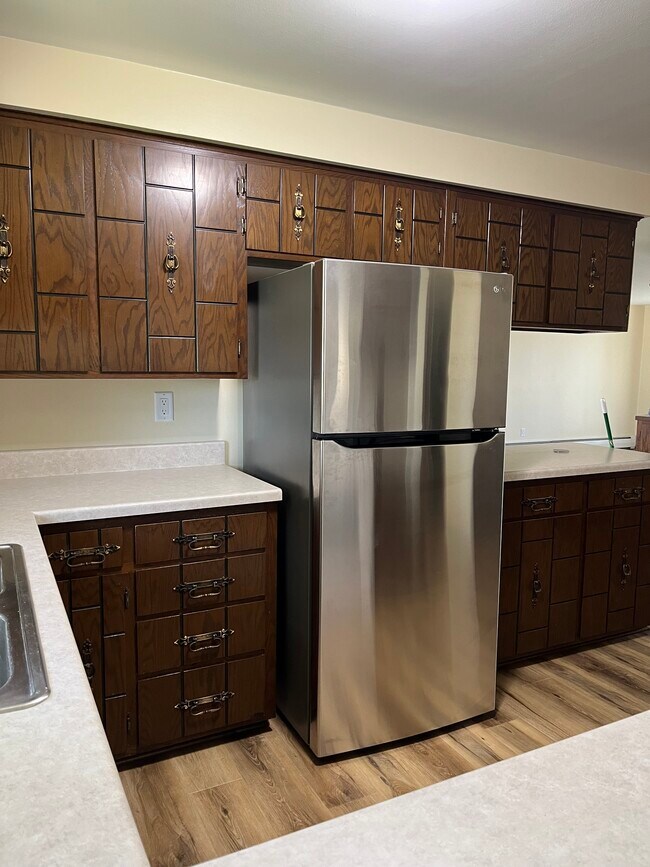 Newer stainless-steel refrigerator - 2790 S Ridge Rd