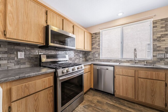 Building Photo - Gated Living with Community Pool & Thoughtfully Designed Open Layout!