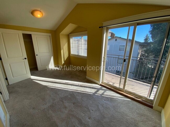 Building Photo - Spacious townhome with private backyard, garage parking, multiple decks, and a dedicated home off...