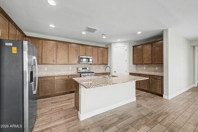 Building Photo - 9701 E Spiral Ave