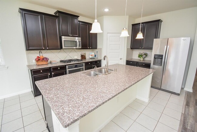 Building Photo - 22211 Weller Oaks Dr