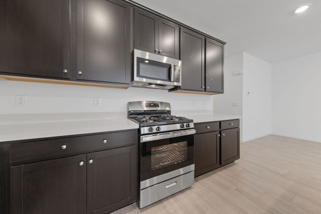 Building Photo - Brand New 3 Bedroom Townhome with Premium ...