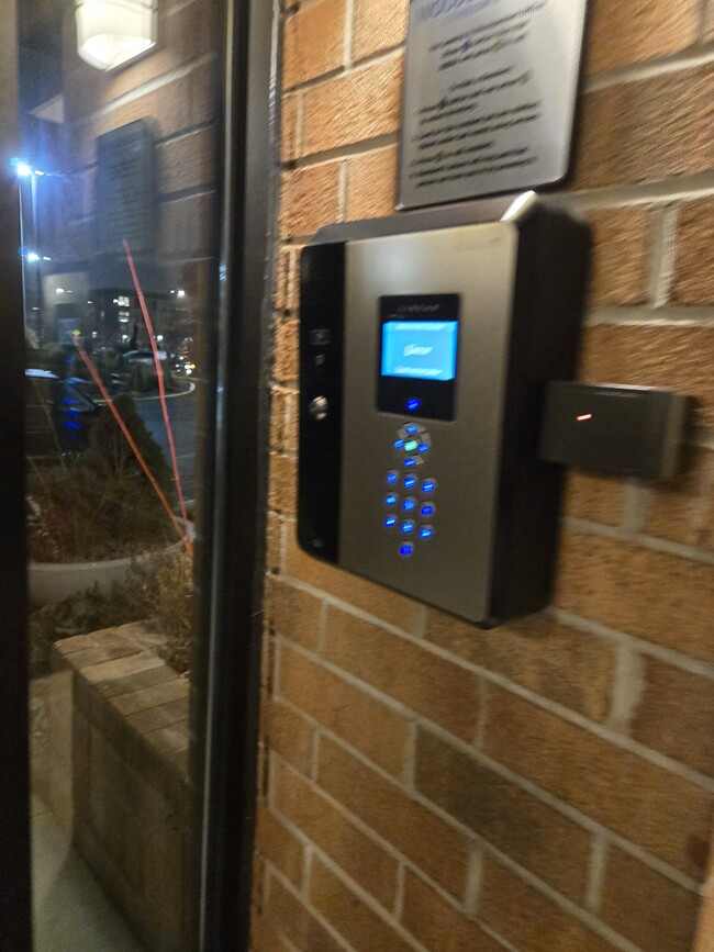 Door intercom at entrance of building - 3423-407 S Cottage Grove Ave