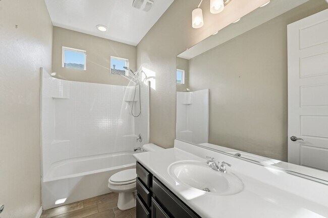 Building Photo - Stunning 4-Bed + Den Eastmark Home with Modern Upgrades Throughout