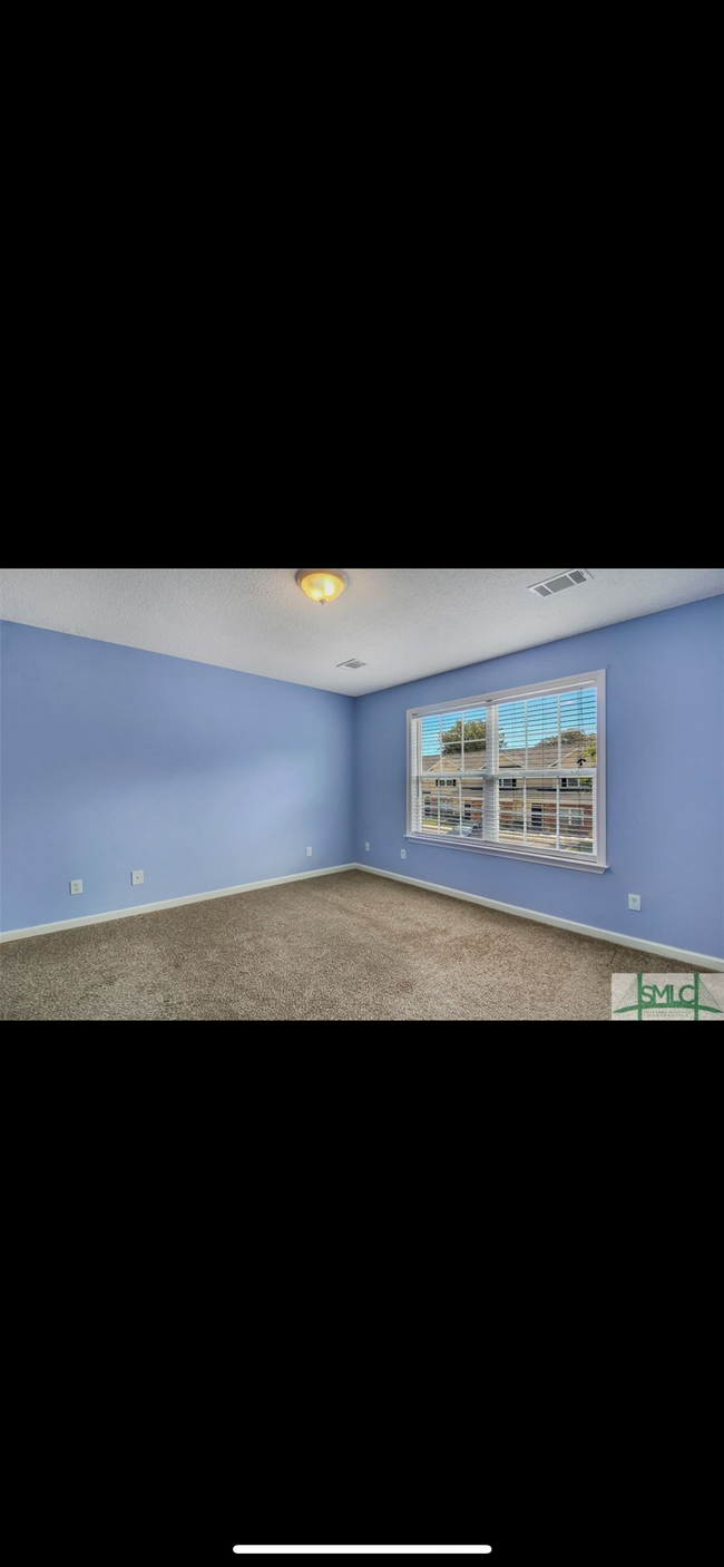 Bedroom 3– spacious walk in closet just as pictured with bedroom 2 - 400 Tibet Ave