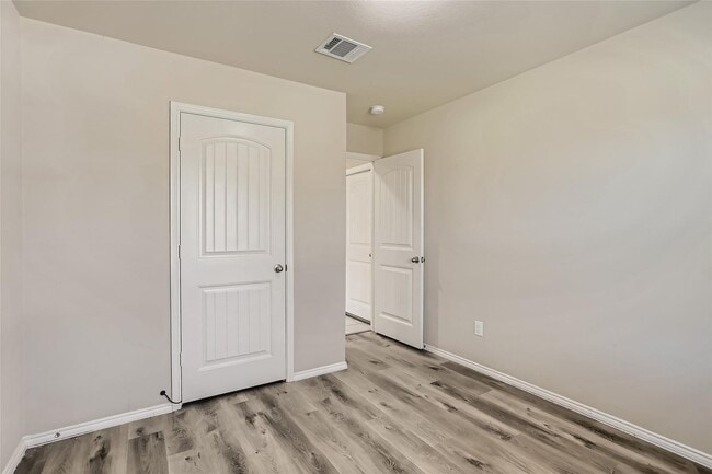 Building Photo - This well-maintained 4 bedroom home is located in a quiet neighborhood that has a community park ...