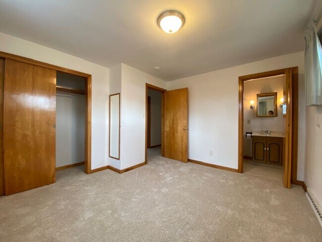 Building Photo - Welcome to this charming three-bedroom, tw...