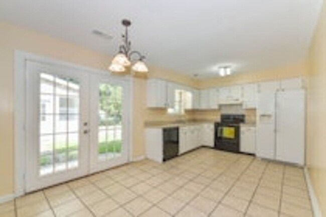 Building Photo - Pet Friendly - Fully Fenced in Yard with Two Storage Buildings