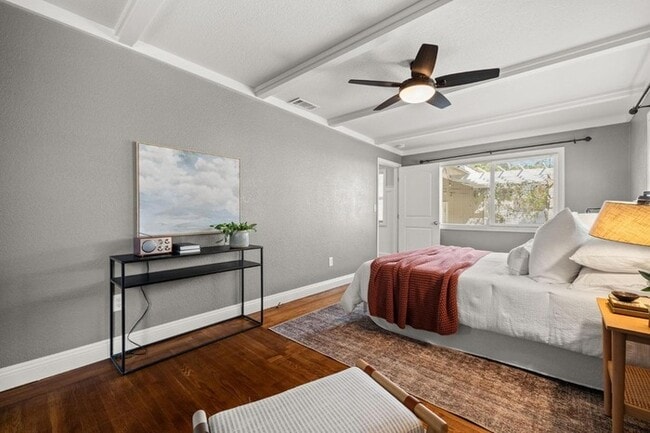 Building Photo - Welcome to this stunning 4-bedroom, 2-bath...