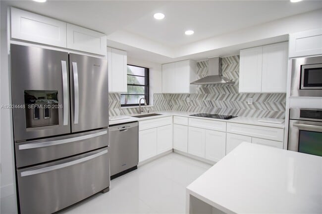 Building Photo - 1222 Hillsboro Mile