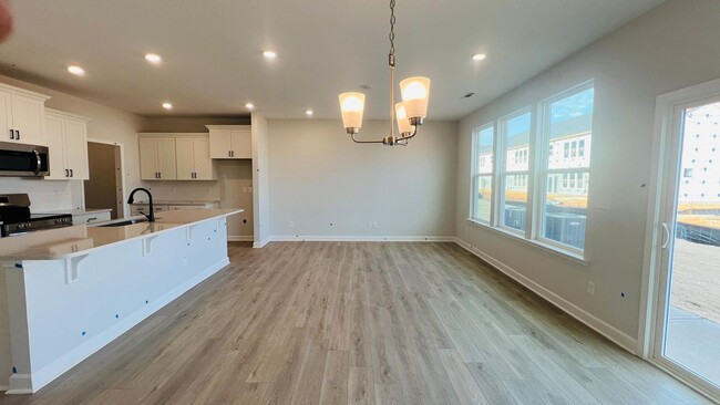 Building Photo - BRAND NEW & Beautiful Townhome with 2 car ...