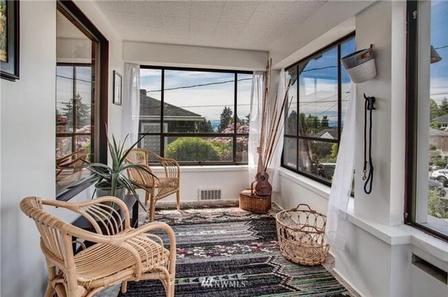 Building Photo - Timeless Charm Meets Thoughtful Updates in This Light-Filled Retreat