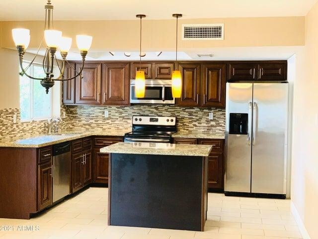 Building Photo - 8832 E Lupine Ave