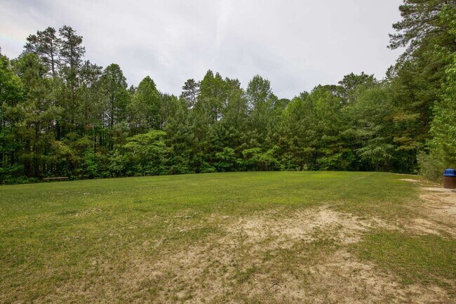 Building Photo - "Spacious 4-Bedroom Gem with 2.5 Baths at ...
