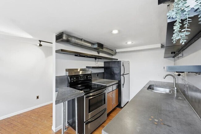 Building Photo - Industrial NYC-Style Loft | Battleship Building | 3 Parking Spots Included