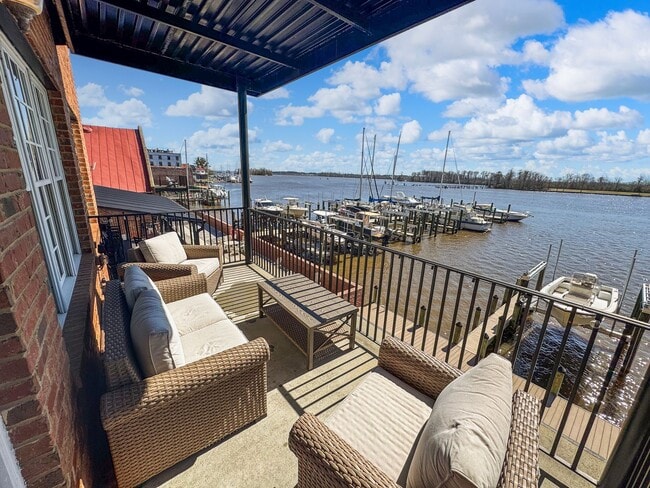 Building Photo - Fully Furnished Waterfront Elegance on Mai...