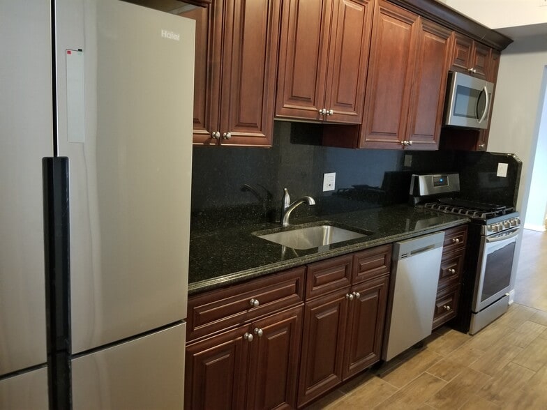 Building Photo - 1303 W Pratt Blvd