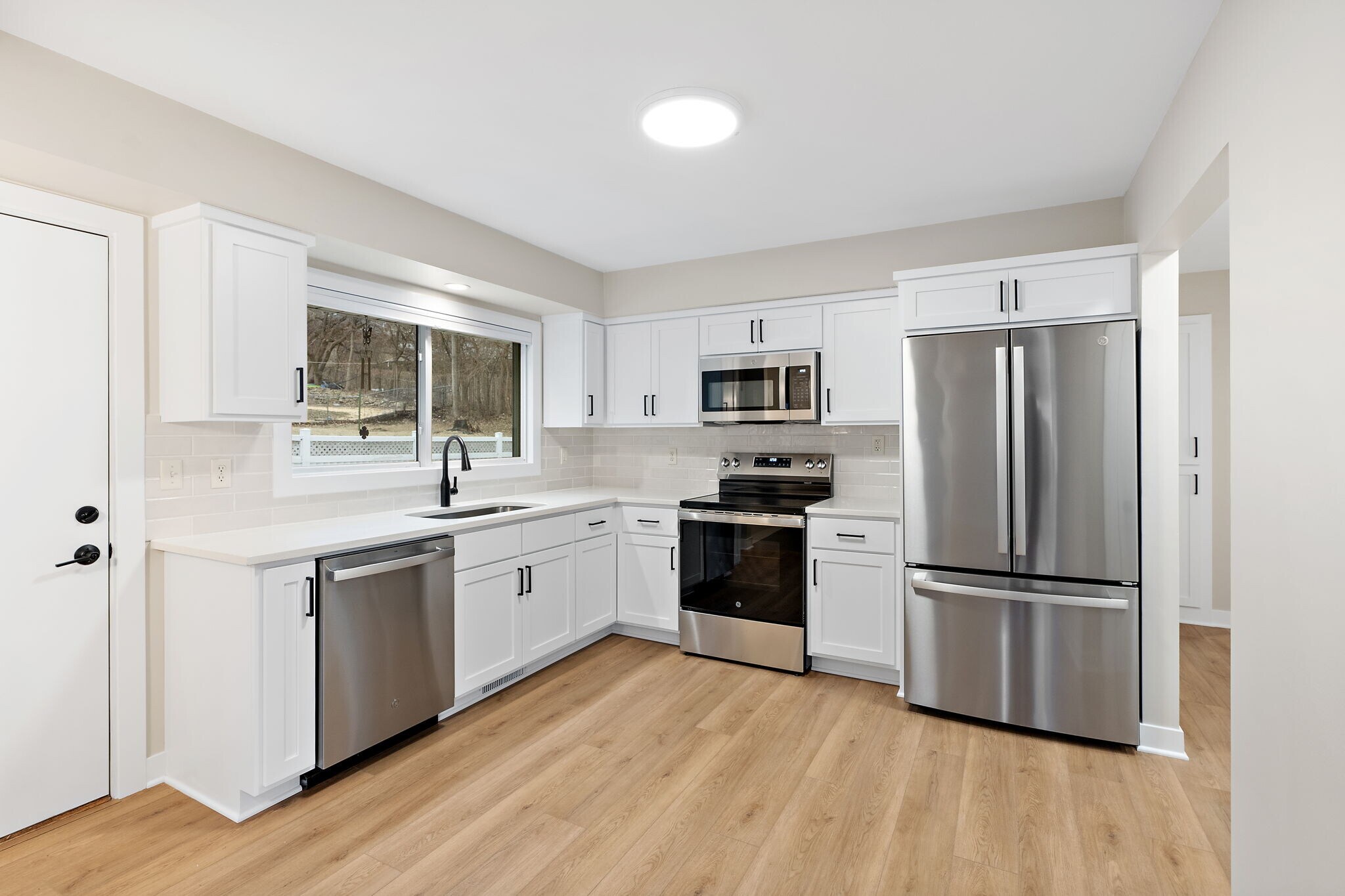 Kitchen with new SS Appliances - 3146 Grimes Ave N