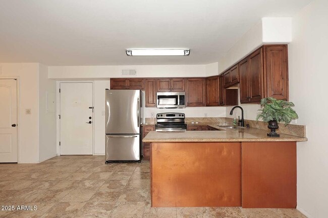 Building Photo - 7910 E Camelback Rd