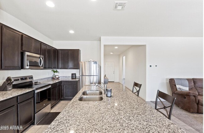 Building Photo - 24559 W Flores Dr
