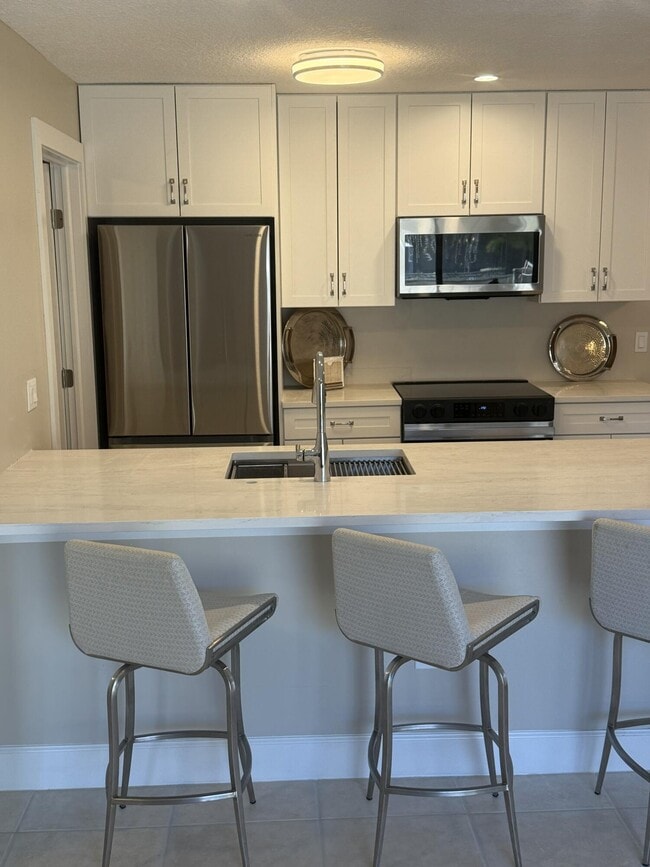 Building Photo - 3957 NW Cinnamon Tree Cir