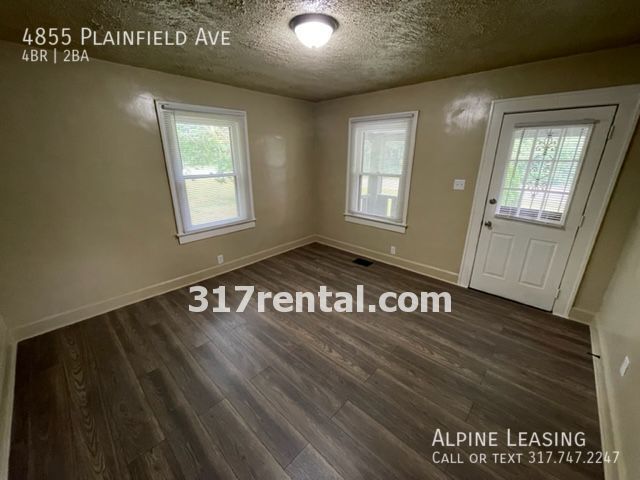 Building Photo - 4/2 with huge 2-car garage/workshop combo ...