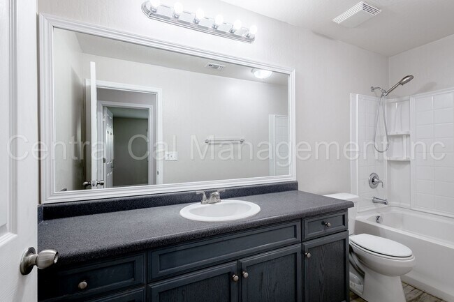 Building Photo - 4 Bedroom/2 Bath Home with Solar - $2695 p...