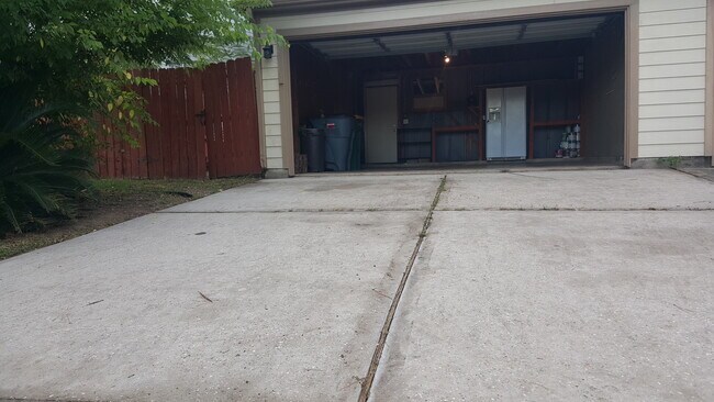 Car Garage * Two car garage. * Custom workshop space in garage with numerous built-ins. * New garag - 23631 Twisting Falls Drive